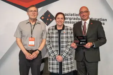 UIC nationally recognized for degree pathway program Left to right, Carl Wieman, Kathryn Chval, and Nikos Varelas